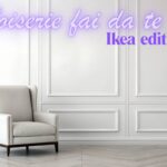 parete con boiserie e poltrona